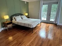 4 bedroom cottage with hot tub, heated pool, lake access, fire pit and game room