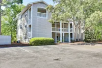 Coastal Condo w/ Screened Deck + Community Pool - balcony
