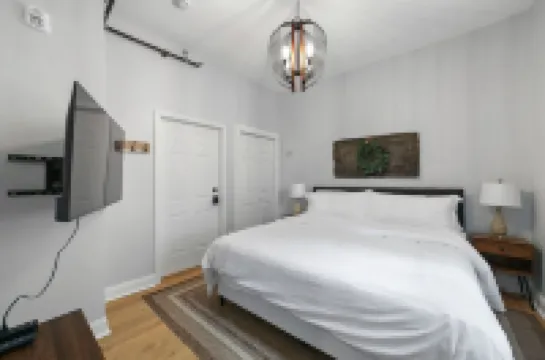 The Owl Suite at Divine Otter Hotels near St. Charles Historic District