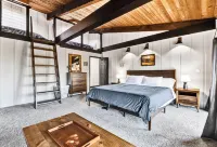 Spacious A-Frame sleeps 25 on 5 wooded acres with a private fishing pond