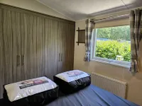 Modern chalet with cozy porch: the Veluwe Feel Good Hotels in Epe