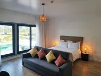 Room with private bathroom and pool view at Casa das Vinhas in Sesimbra