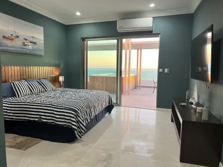 Oceanview Rooftop with Lofts, Private Jacuzzi, Pool, & Beach Access