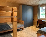 New vacation apartment in the middle of the SkiArena Andermatt Sedrun with indoor golf course