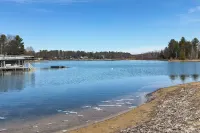 1/2 Mi to Lake! Traverse City Retreat w/ Dock