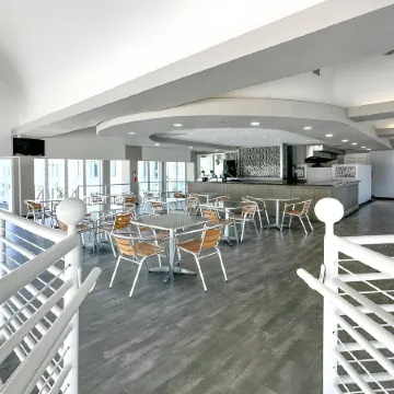 Boardwalk Inn and Suites Отели рядом с достопримечательностью «Выставочный и конгресс-центр Ocean Center»