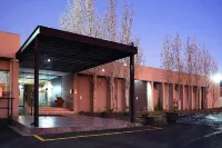 Qs Evander Hotel and Apartments - バー