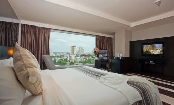 Golden Tulip Mandison Suites