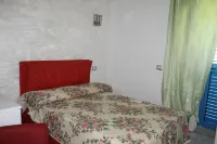 Room in Guest Room - S'Olivariu Village Affittacamere - Deluxe King Room Hotels in Carbonia