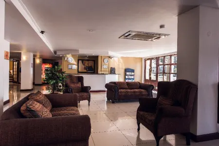 Airport Inn and Suites Отели в г. Кемптон Парк