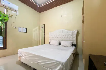 Aisyah Homestay Syariah RedPartner Отели в г. Ланкат