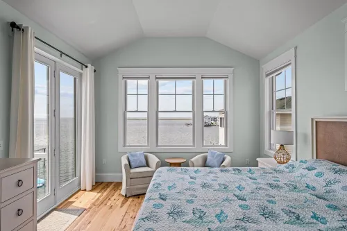 Beautiful Bayfront w/ Heated Pool & Dock.  6 Bedrooms, all w/ Ensuite Bathrooms.