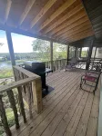 Cozy Lake Cottage with private view of Table Rock Lake and Arkansas Mountains.