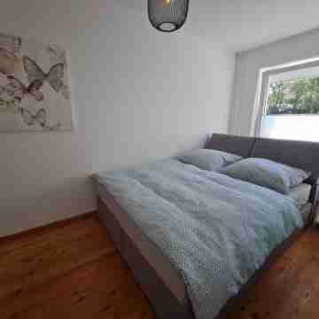 Modern city apartment with balcony and private parking space in a quiet location Rooms