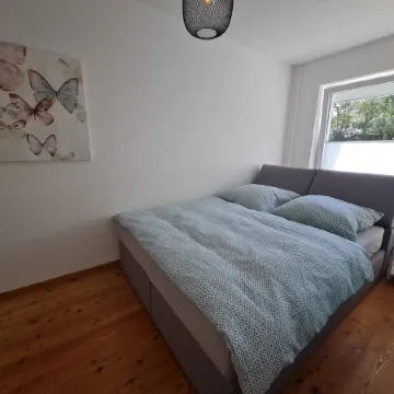 Modern city apartment with balcony and private parking space in a quiet location