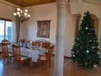 AUTHENTIC SANTA FE TUSCAN-STYLE VILLA WITH PANORAMIC VIEWS.