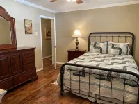 Experience tranquility in this spacious 4- bedroom house on Lake D'Arbonne.
