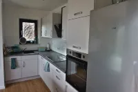 Fewo EG am Fluss mit Terrasse - Eine Grüne Oase