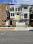 Oceanside beach retreat 3 min walk to beach Rooftop views - 3-Star