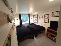 Little house in the woods, close to the lake,town and mountain.