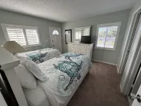 End unit with extra windows. Steps to the beach, private beach access!