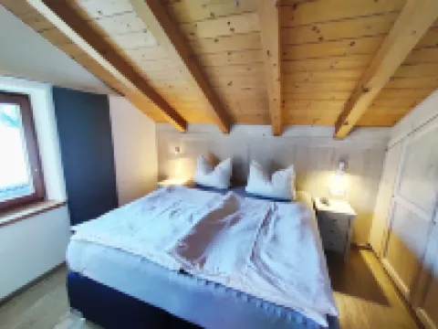 Cozy vacation apartment with two bedrooms, wood-burning stove and spacious balcony