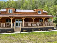 Cozy hillside retreat near trout stream, public forest and UTV trails.
