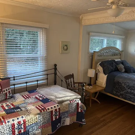 Cozy Cottage with access to and partially obstructed views of the bay.