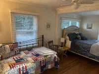 Cozy Cottage with access to and partially obstructed views of the bay.