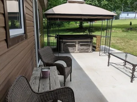 Cabin w/ Hot Tub on Small Pond