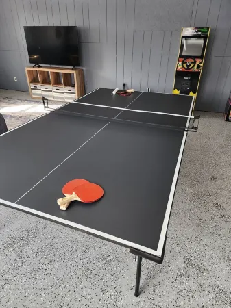 Cabin in Oscoda with hot tub and game room