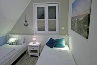 Reethaus Lise - with beach chair, fireplace and handcart - 12 minutes walk to the beach Các khách sạn ở Glowe