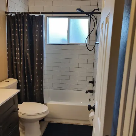 Centrally located close to everything with private entry and private yard.