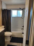 Centrally located close to everything with private entry and private yard.