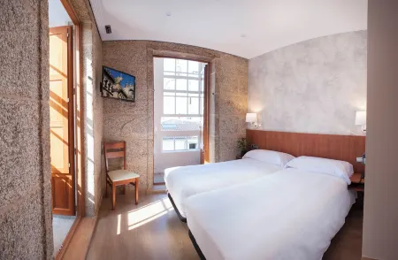 Pensión O Códice Отели рядом с достопримечательностью «Miradoiro Costa Vella»