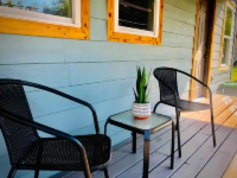 Relaxing Backyard and Cozy Seating Area - Charming Urban Haven