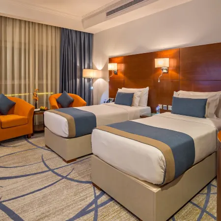 Jiwar Almasi Hotel Отели рядом с достопримечательностью «Торговый центр Jamea»