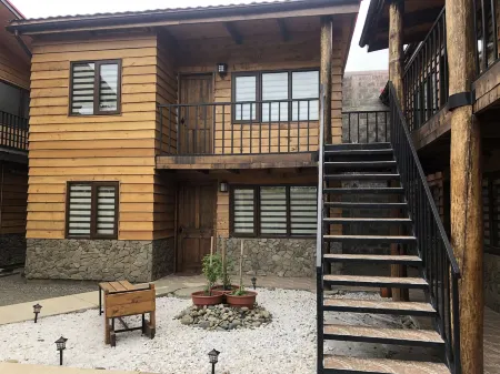 Magellanicus Rustic Suites Отели в г. Магальянес