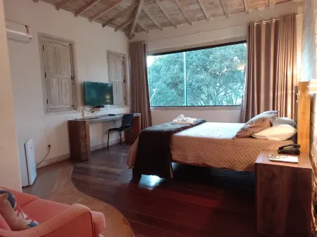 Pousada Cantares Отели рядом с достопримечательностью «Sao Jose Fountain»