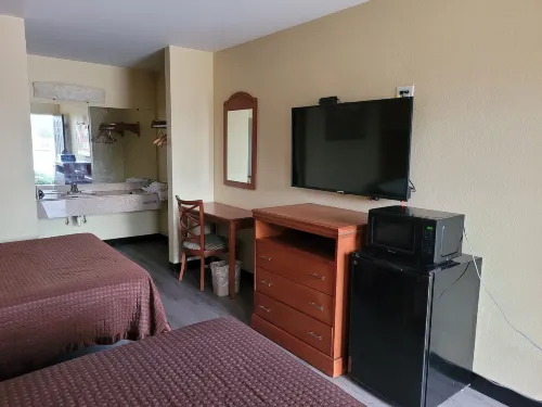 Stay Inn Checotah Near Eufaula Lake - parking