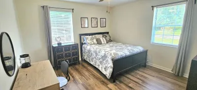 Charming 3/1 home in Jacksonville, 8 min to Stadium with Large Screen Porch Hotels near Plato's Closet - Regency, FL