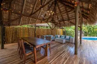 Spacious 3-Bedroom Villa. with a pool, rancho- STEPS away from Langosta Beach.