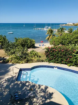 Holly's Beach Folly - Amazing Waterfront Villa, Sandy Beachfront, Pool, East End