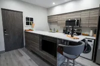 Lake Okanagan brand new beach condo with AC, heated outdoor pool, patio and BBQ.