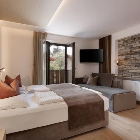 Aparthotel Familiaris - Family Apartments - Pools & Spa in Dolomites