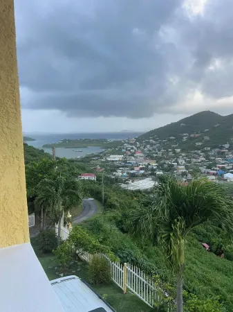 "Your Caribbean Haven: Where Comfort Meets Local Charm"