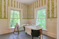 Relax in Style at Historic Modern on Main With Modern Amenities & Wooded Views