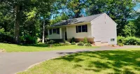 Rustic Charm Meets Modern Comfort 3-Bedroom Raised-Ranch Cottage in Wooded Area Hotels in Waterbury