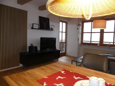 Cozy vacation apartment with large balcony. Mountain view included.