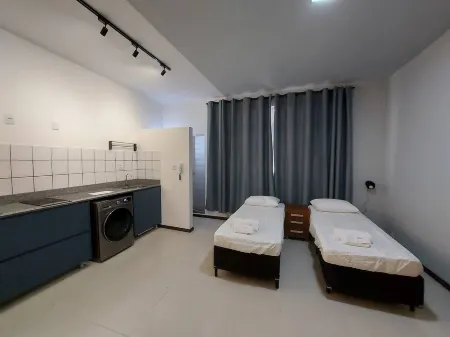 Cozy studio apartment close to Aperam Centro! Отели в г. Тимотеу
